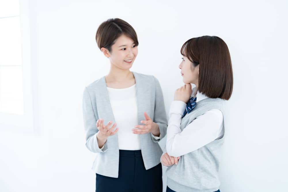 A,Teacher,In,A,Suit,And,A,Student,In,A